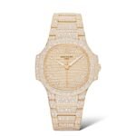 Patek Philippe 35.2mm 7118/1450R Nautilus Ladies Automatic Self-Winding Rose Gold Paved With Diamonds - Exotic Boutique Dubai