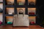 Hermès Birkin 30 in Gris Epsom leather from 2017, featuring elegant Gold Hardware. A structured and durable design showcasing Hermès’ craftsmanship, this pre-loved piece embodies timeless sophistication and refined luxury.